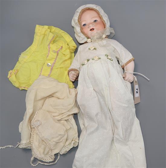 An Armand Marseille bisque-headed My Dream Baby doll, no. 351/3 1/2K, with additional clothing